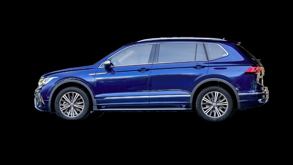 Tiguan Platinum nhận diện qua bậc lên xuống cố định và bodykit sơn đồng màu thân xe